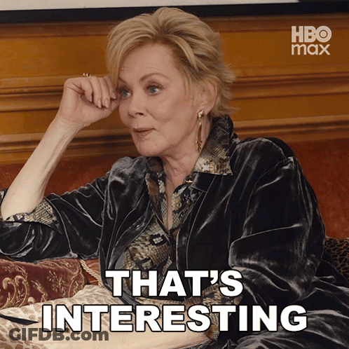 Woman Sitting On Couch Saying That's Interesting GIF