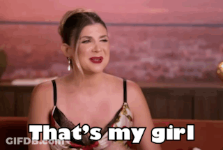 Woman Sitting On Couch Saying That's My Girl GIF