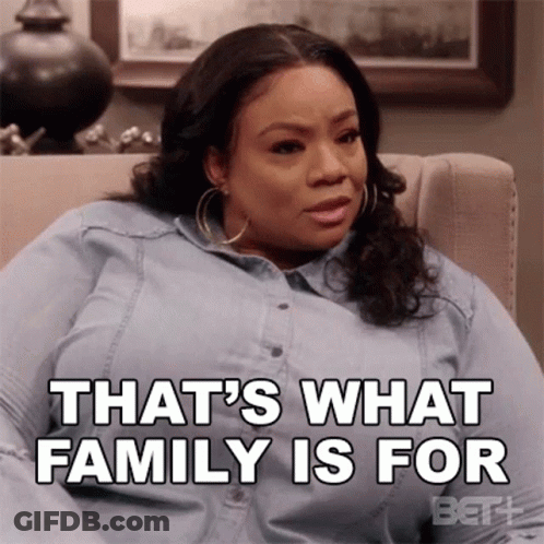 Woman Sitting On Couch Saying That's What Family Is For GIF