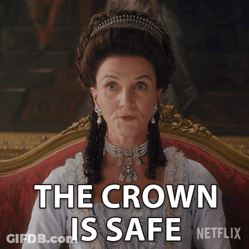 Woman Sitting On Couch Saying The Crown Is Safe GIF