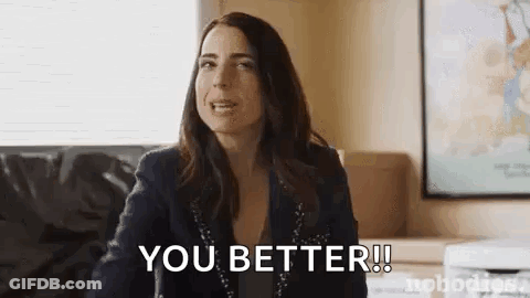 Woman Sitting On Couch Saying You Better GIF