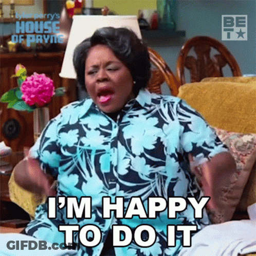 Woman Sitting On Couch Says I'm Happy To Do It GIF