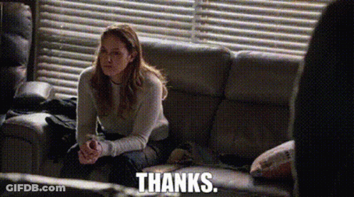 Woman Sitting On Couch Says Thanks GIF