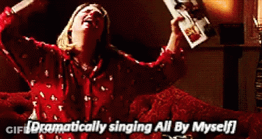 Woman Sitting On Couch Singing Holding Beer GIF