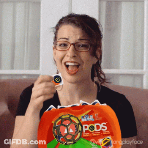 Woman Sitting On Couch With Bag Of Pods GIF