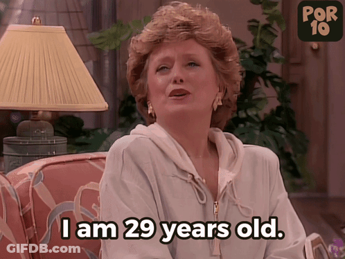 Woman Sitting On Couch With I Am 29 Years Old Text GIF