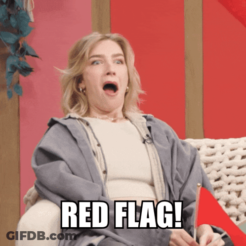 Woman Sitting On Couch With Open Mouth GIF