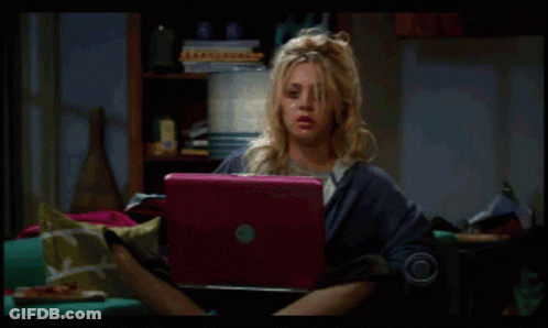 Woman Sitting On Couch With Pink Laptop GIF