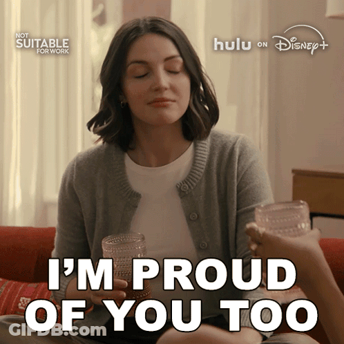 Woman Sitting On Couch With Two Glasses Saying I'm Proud Of You Too GIF