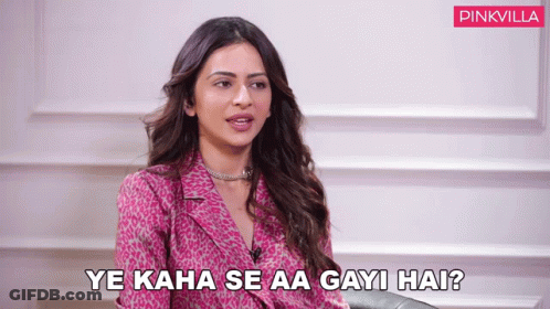 Woman Sitting On Couch Ye Kaha Se Aa Gayi Hai GIF
