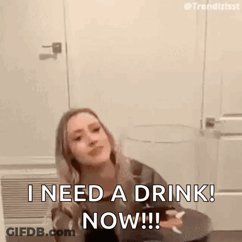 Woman Sitting On Floor Holding Wine Saying I Need A Drink Now GIF