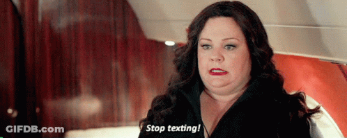 Woman Sitting On Plane Saying Stop Texting GIF