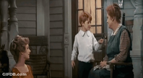 Woman Sitting On Porch Talking To Boy And Woman GIF