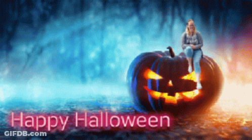 Woman Sitting On Pumpkin Happy Halloween GIF