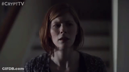 Woman Sitting On Stairs With Eyes Closed GIF
