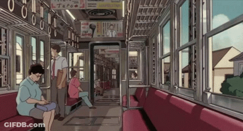 Woman Sitting On Train Looking At Phone GIF