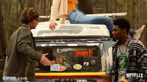 Woman Sitting On Vehicle With Semper Fi GIF