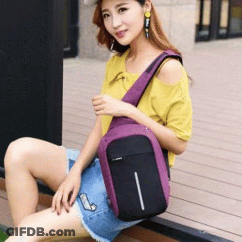 Woman Sitting On Wooden Deck Holding Purple Backpack GIF