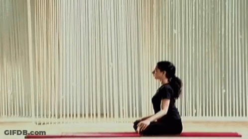 Woman Sitting On Yoga Mat GIF