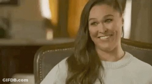 Woman Sitting Smiling GIF