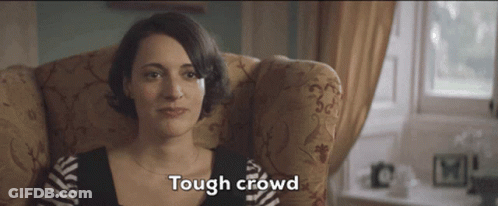Woman Sitting Tough Crowd GIF