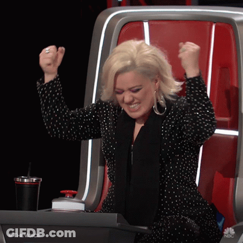 Woman Sitting With Arms Up The Voice GIF