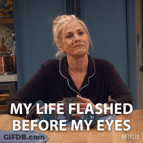 Woman Sitting With Coffee And Flashback Caption GIF