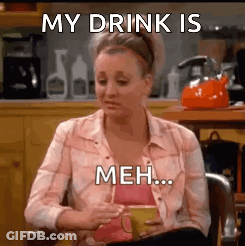 Woman Sitting With Coffee Saying My Drink Is Meh GIF