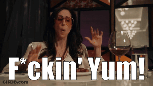 Woman Sitting With Food And Wine GIF