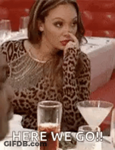 Woman Sitting With Martini Glass GIF