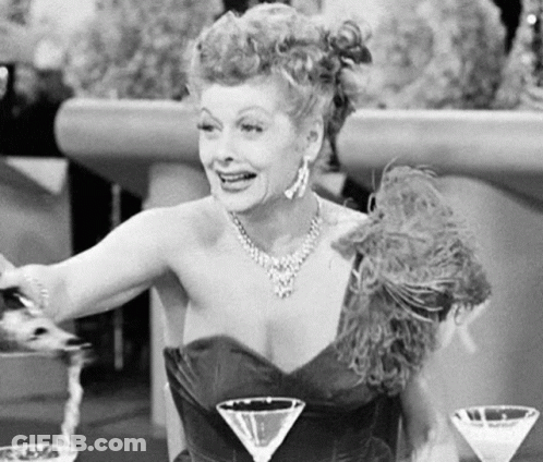 Woman Sitting With Three Martini Glasses GIF
