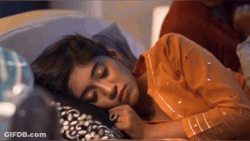 Woman Sleeping In Bed With Eyes Closed GIF