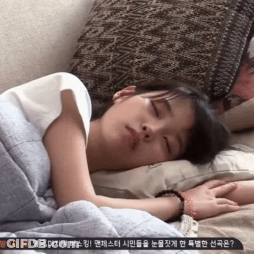 Woman Sleeping On Bed At 10:30 GIF