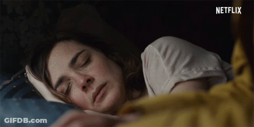 Woman Sleeping Under Netflix Logo GIF