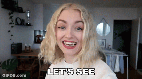 Woman Smiling And Saying Lets See GIF