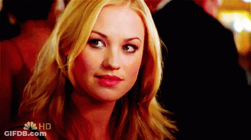 Woman Smiling At Man In Mirror GIF