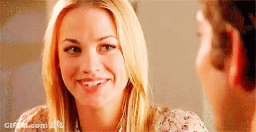 Woman Smiling At Man In Mirror GIF