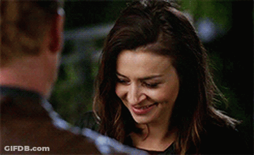 Woman Smiling At Man GIF