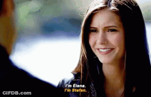 Woman Smiling At Man Saying I'm Elena I'm Stefano GIF