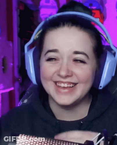 Woman Smiling Blue Headphones Purple Background GIF