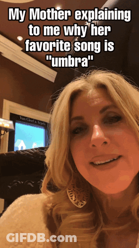 Woman Smiling Explaining Umbra Song GIF
