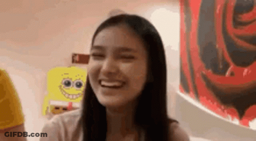 Woman Smiling Eyes Closed With SpongeBob Painting GIF