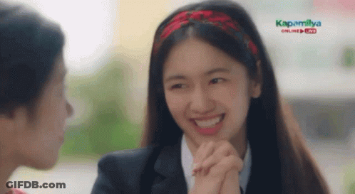 Woman Smiling Holding Another Woman's Hand In Front Of Kapamilya Online Live Screen GIF