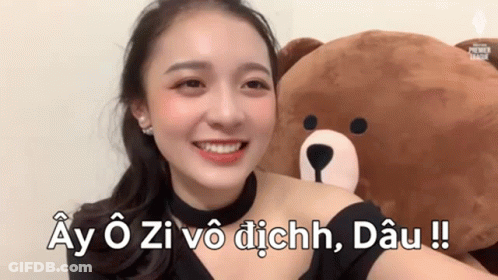 Woman Smiling Holding Teddy Bear Ay O Zi Vo Dichh Dau GIF