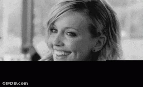 Woman Smiling Holding Water Glass GIF