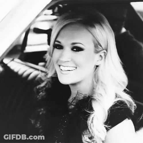 Woman Smiling In Back Seat Of Car GIF
