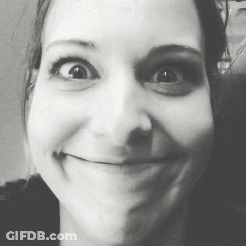 Woman Smiling In Black And White GIF