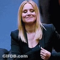 Woman Smiling In Black Jacket And Shirt GIF