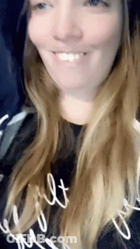 Woman Smiling In Black Shirt Saying Built GIF