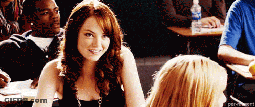 Woman Smiling In Classroom Next To Another Woman GIF